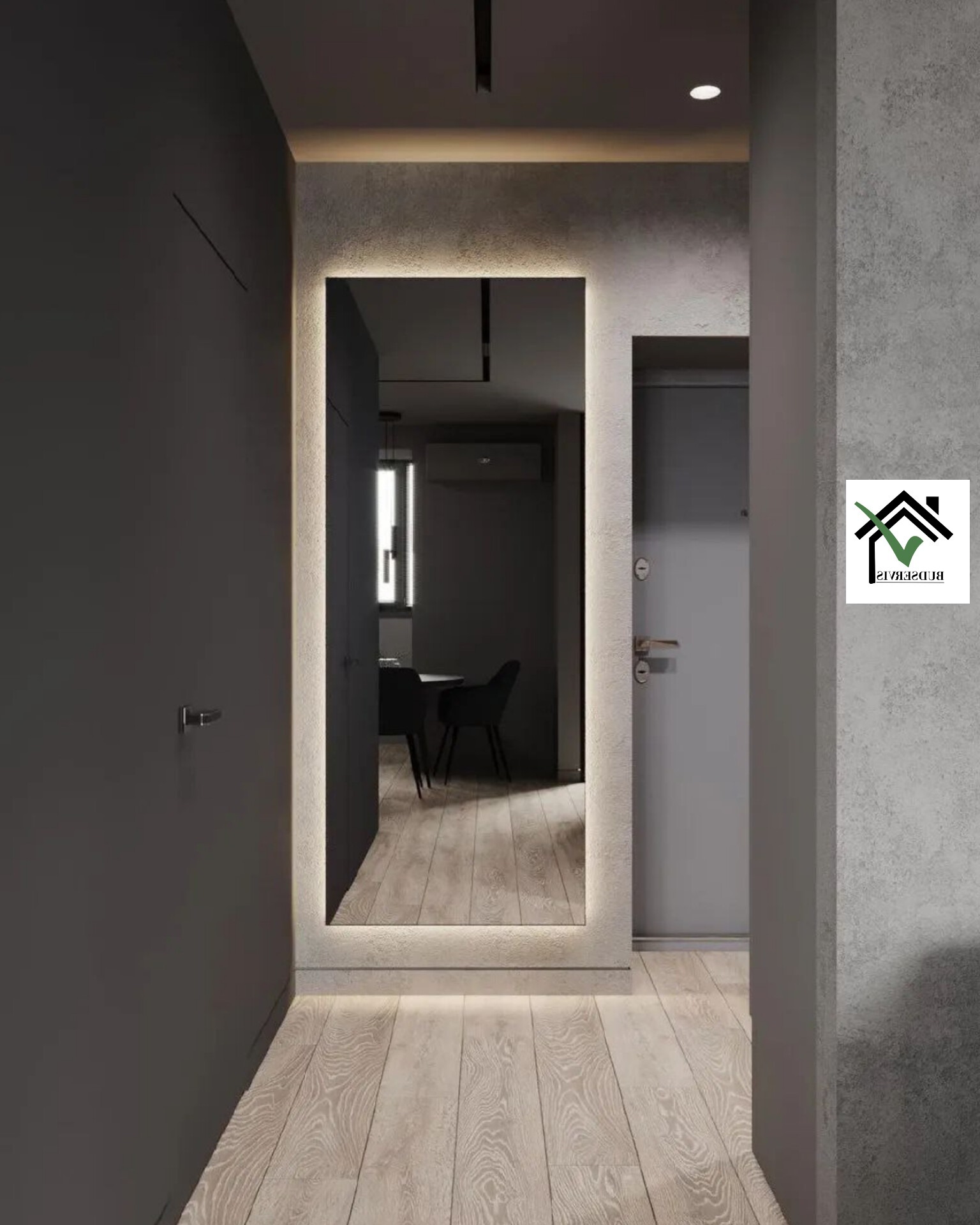 Nowoczesny korytarz z dużym lustrem z podświetleniem LED, szare ściany, jasna drewniana podłoga.