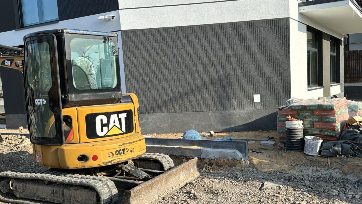 usługi ładowarką/koparką