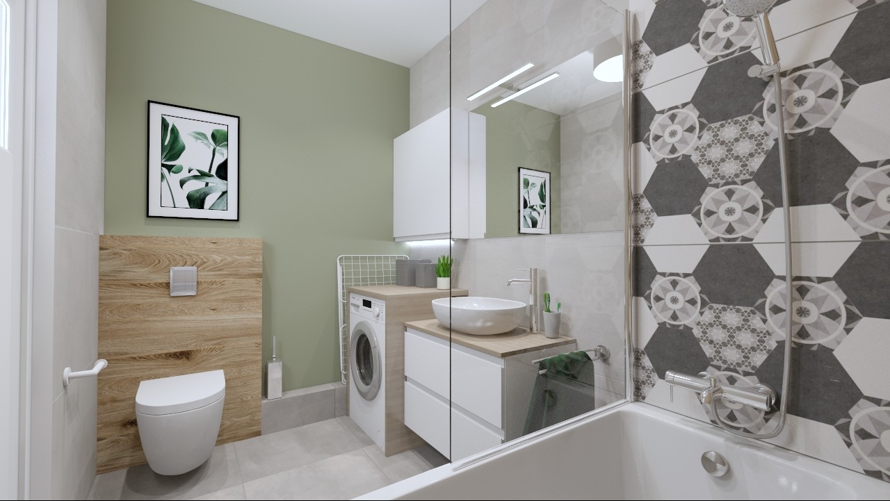 Nowoczesna łazienka z zieloną ścianą, drewnianym akcentem przy toalecie, umywalką nablatową, pralką w zabudowie i heksagonalnymi płytkami nad wanną.