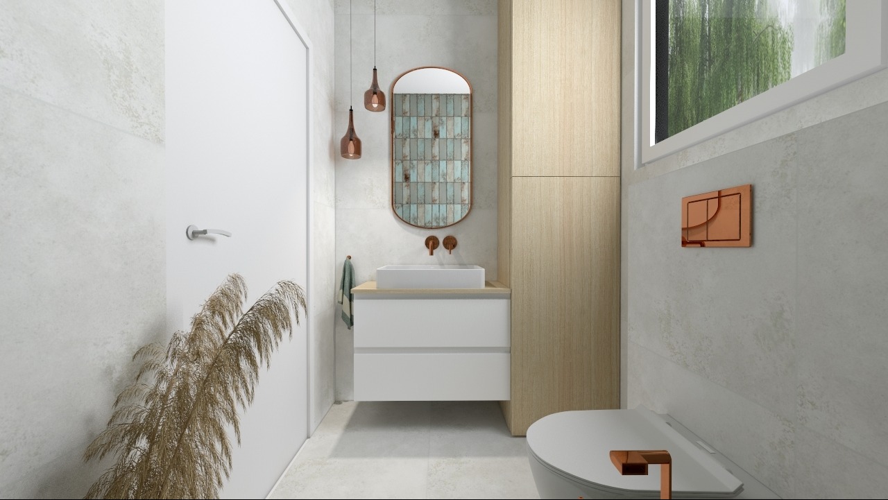 Wizualizacja łazienki z umywalką nablatową, owalnym lustrem z mozaiką, wiszącą toaletą i elementami dekoracyjnymi w odcieniach miedzi.