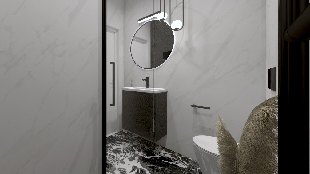 Nowoczesna łazienka z umywalką na szafce w kolorze antracytu, okrągłym lustrem z podświetleniem LED, marmurową posadzką i dekoracyjną trawą pampasową.