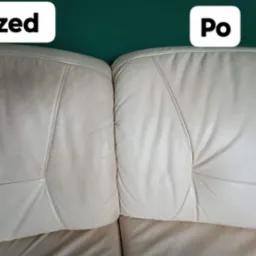 Fragment kremowej skórzanej kanapy, porównanie stanu przed i po czyszczeniu, widoczne różnice w zabrudzeniach i odświeżeniu koloru.