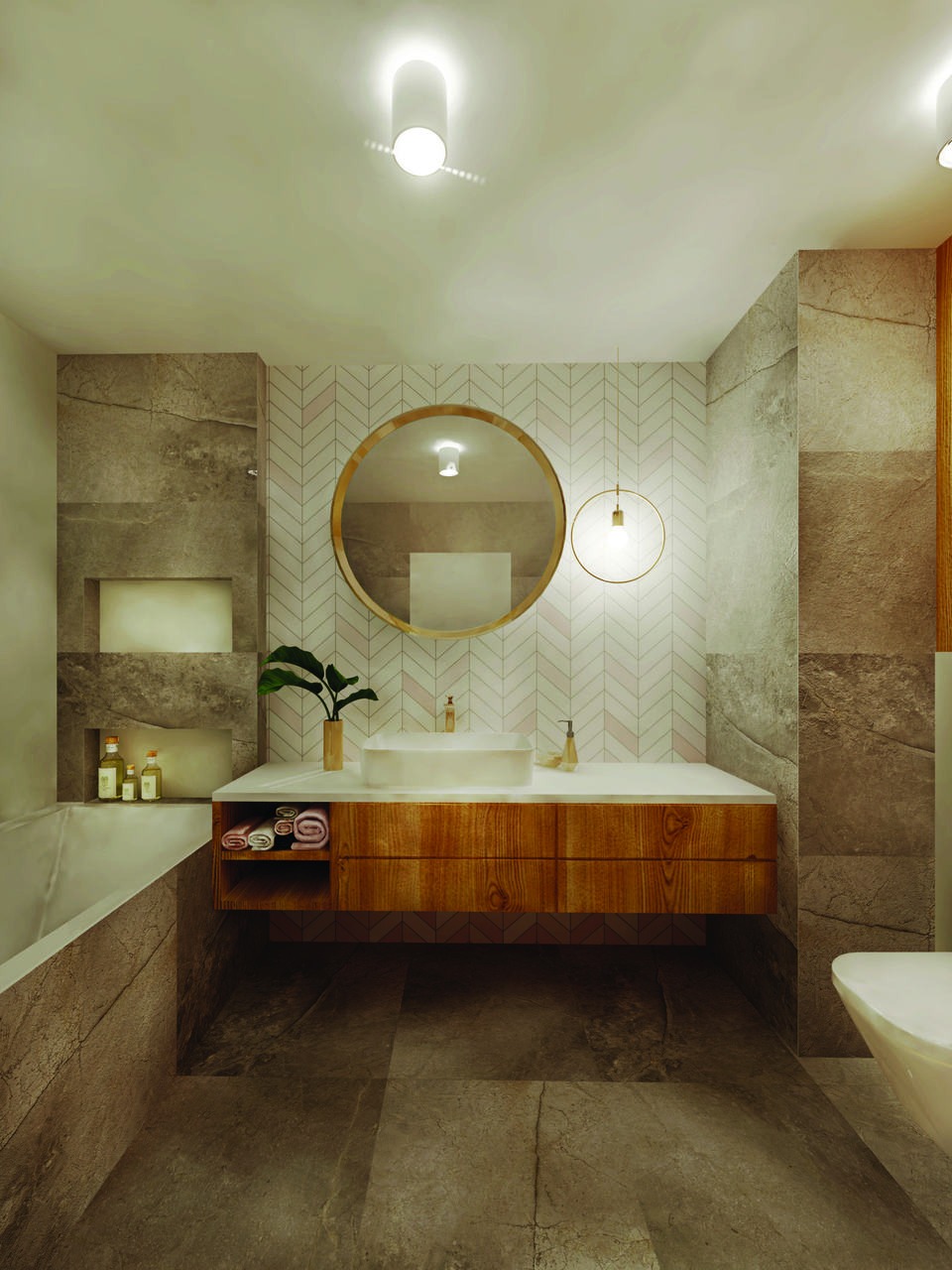 Nowoczesna łazienka z drewnianą szafką pod umywalką, okrągłym lustrem w złotej ramie i geometryczną tapetą w odcieniach bieli i różu. Wnęka obok wanny z dekoracyjnymi buteleczkami i zwiniętymi...