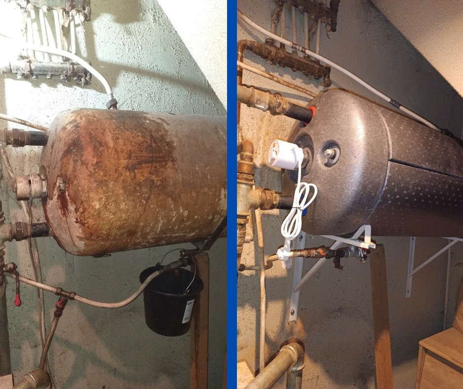 Porównanie: Stary, zardzewiały bojler zestawiony z nowym, zaizolowanym bojlerem zamontowanym na białych wspornikach w Kętrzynie. Widoczne przyłącza hydrauliczne.