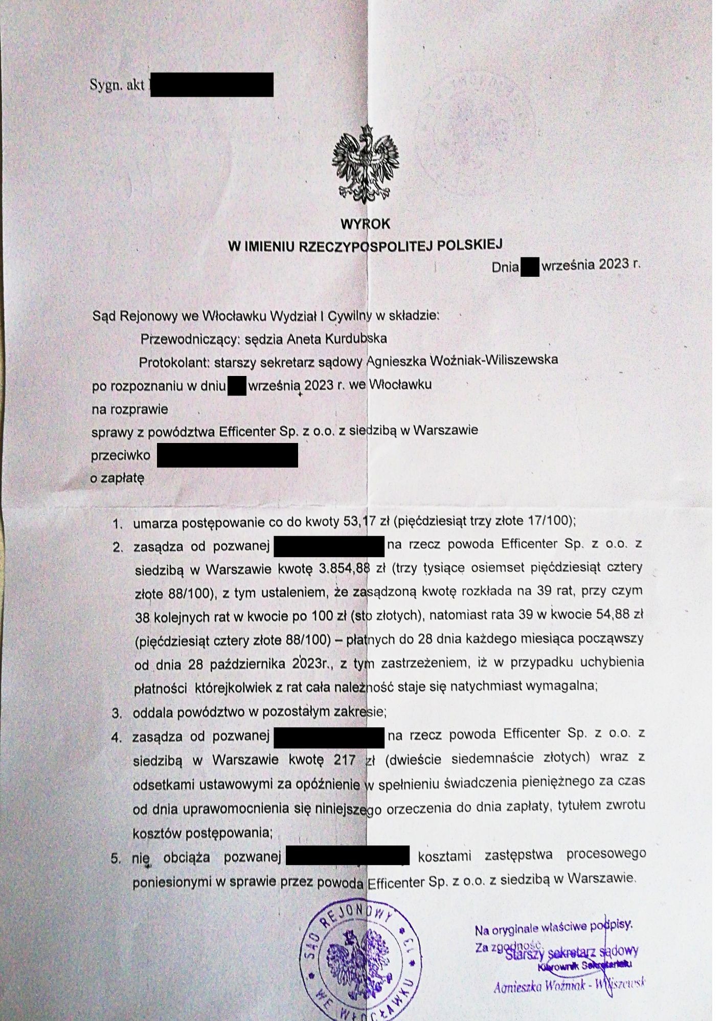 Dokument sądowy - wyrok Sądu Rejonowego we Włocławku z września 2023 r. w sprawie Efficenter Sp. z o.o., z pieczęcią sądu i podpisami. Tekst pisany.