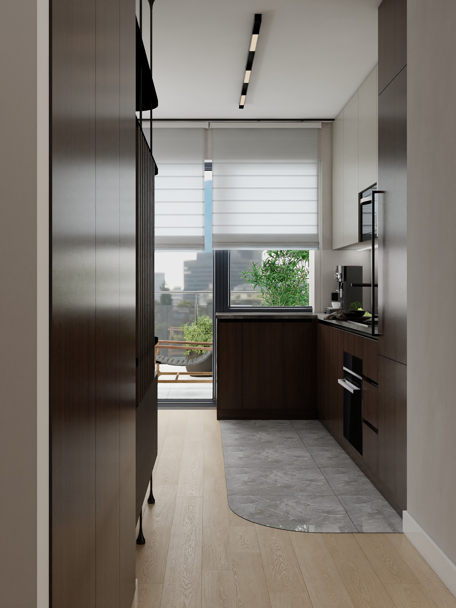 Nowoczesna kuchnia z drewnianymi frontami, szarą podłogą i wyjściem na balkon z widokiem na miasto. Minimalistyczne oświetlenie sufitowe i sprzęt AGD.