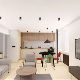 Wnętrze mieszkania w neutralnych barwach: jasny salon z aneksem kuchennym, drewniane akcenty, okrągły stół i sofa. Minimalistyczny design, nowoczesne oświetlenie punktowe.