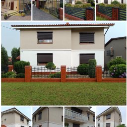 FIRMA OGÓLNOBUDOWLANA DAWID RACZYCKI - Dwukondygnacyjny dom jednorodzinny z brązowymi roletami zewnętrznymi i świeżo pomalowaną elewacją w odcieniach beżu i bieli, ogrodzony niskim, ceglanym płotem z metalowymi przęsłami.