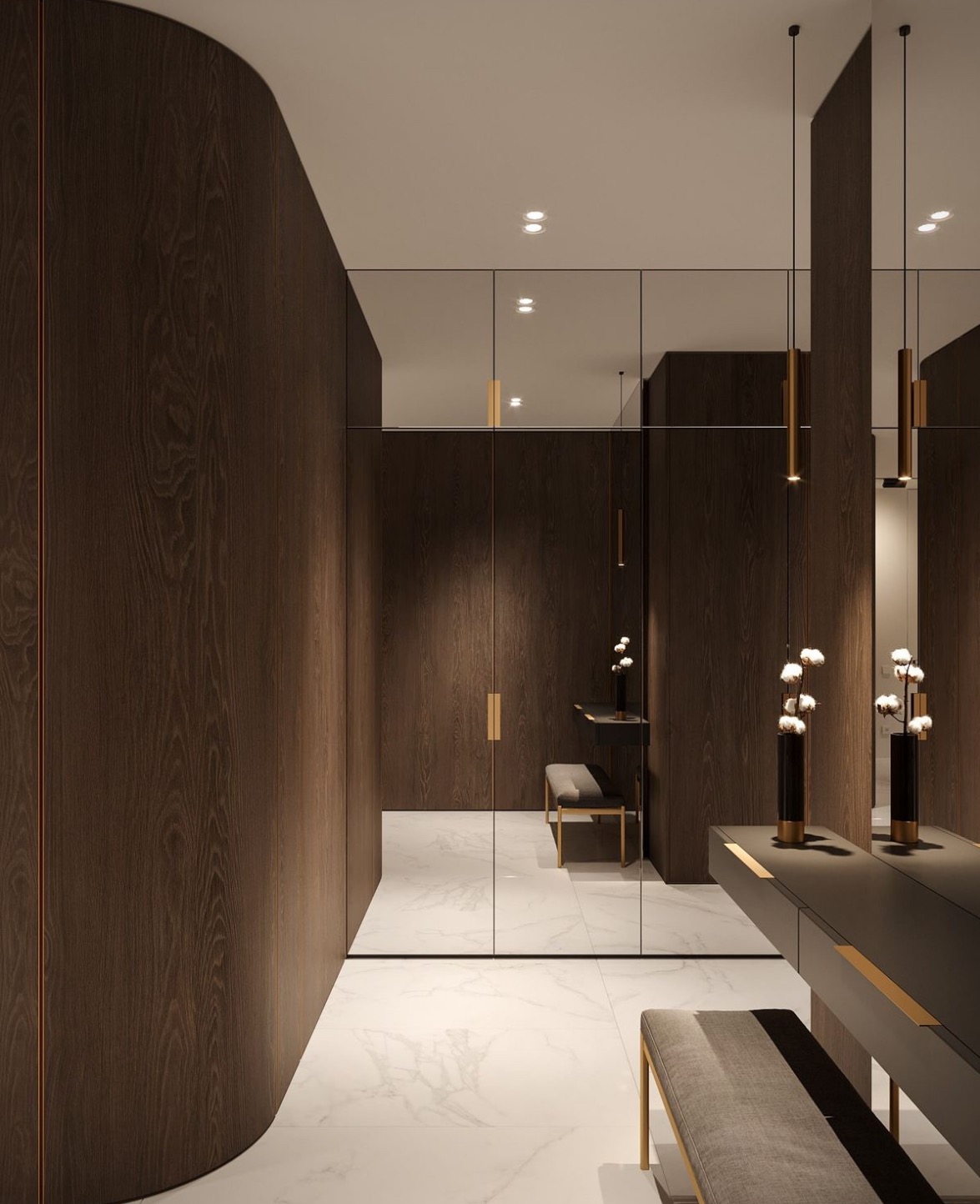 Nowoczesna garderoba z ciemnego drewna z lustrzanymi drzwiami, marmurową podłogą i minimalistycznym oświetleniem punktowym; na blacie dekoracyjne wazony z bawełną.