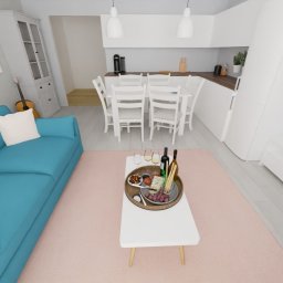 Wojciech Polański - Wizualizacja wnętrza: turkusowa sofa z białymi poduszkami, białe meble kuchenne, stół z krzesłami, gitara w rogu, przekąski na stoliku kawowym, różowy dywan.