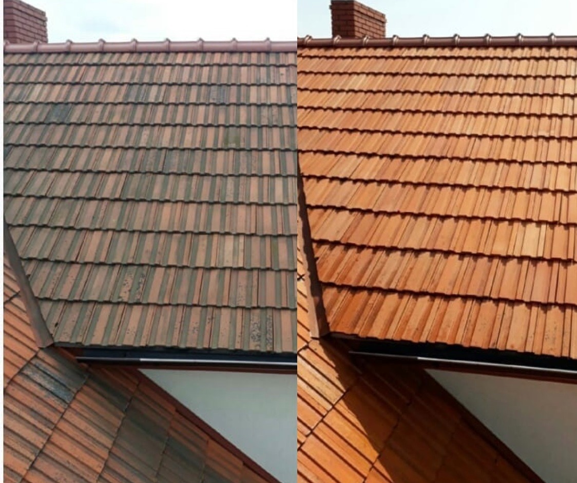 Częściowo wyczyszczony dach z czerwonej dachówki, widoczna wyraźna różnica w kolorze między brudną a czystą powierzchnią.
