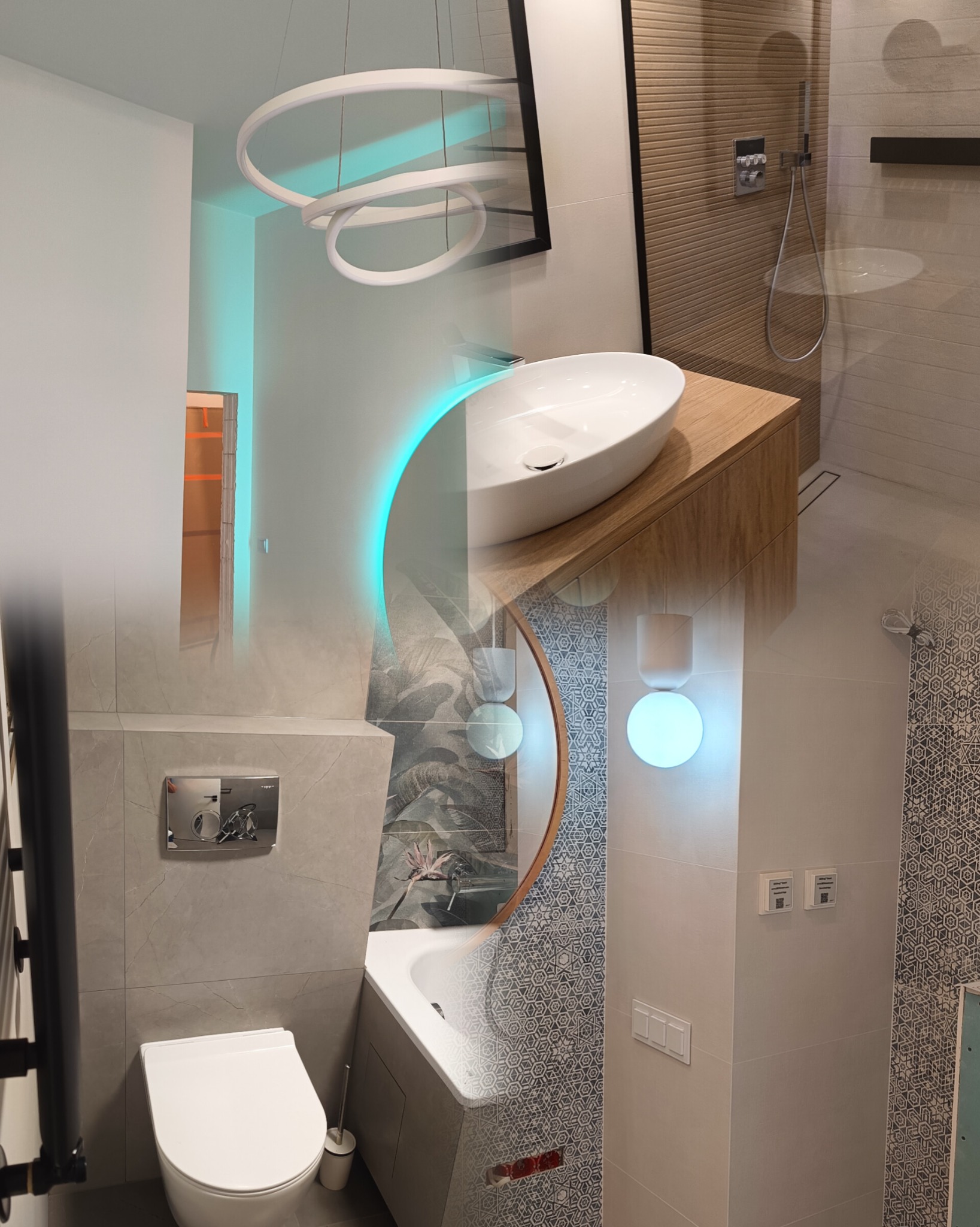 Nowoczesna łazienka z owalną umywalką nablatową, podświetlanym lustrem, wiszącą toaletą i kabiną prysznicową walk-in, wykończona płytkami w różnych wzorach i kolorach, oświetlona designerską lampą...