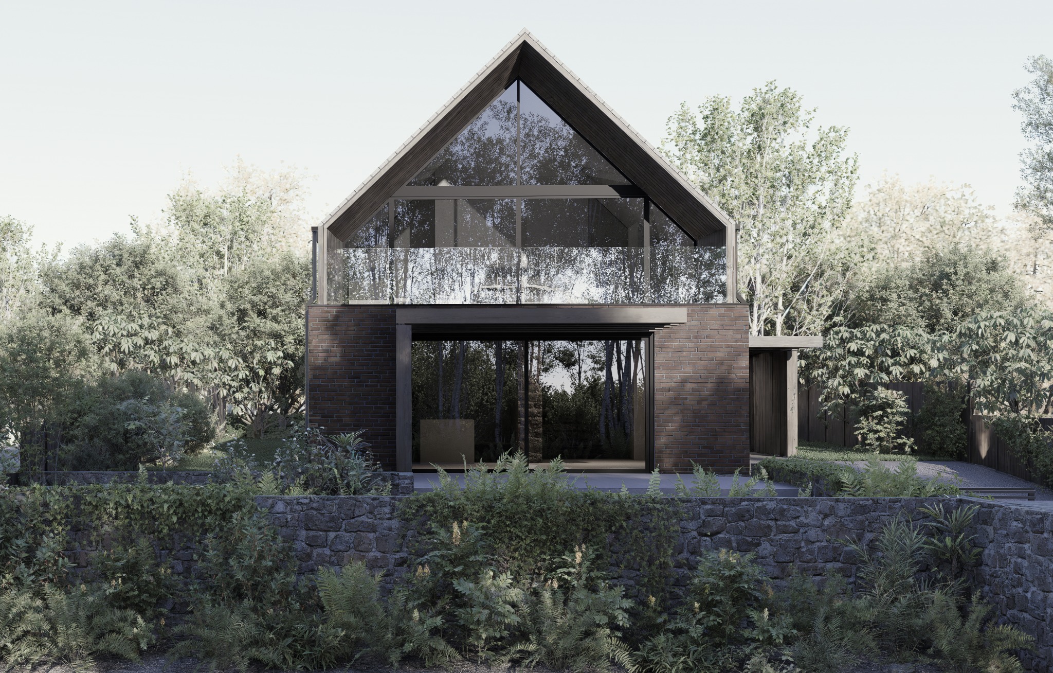 Nowoczesny dom z cegły z dużymi przeszkleniami i balkonem, otoczony zielenią. Widok z poziomu ogrodu, kamienny murek na pierwszym planie.