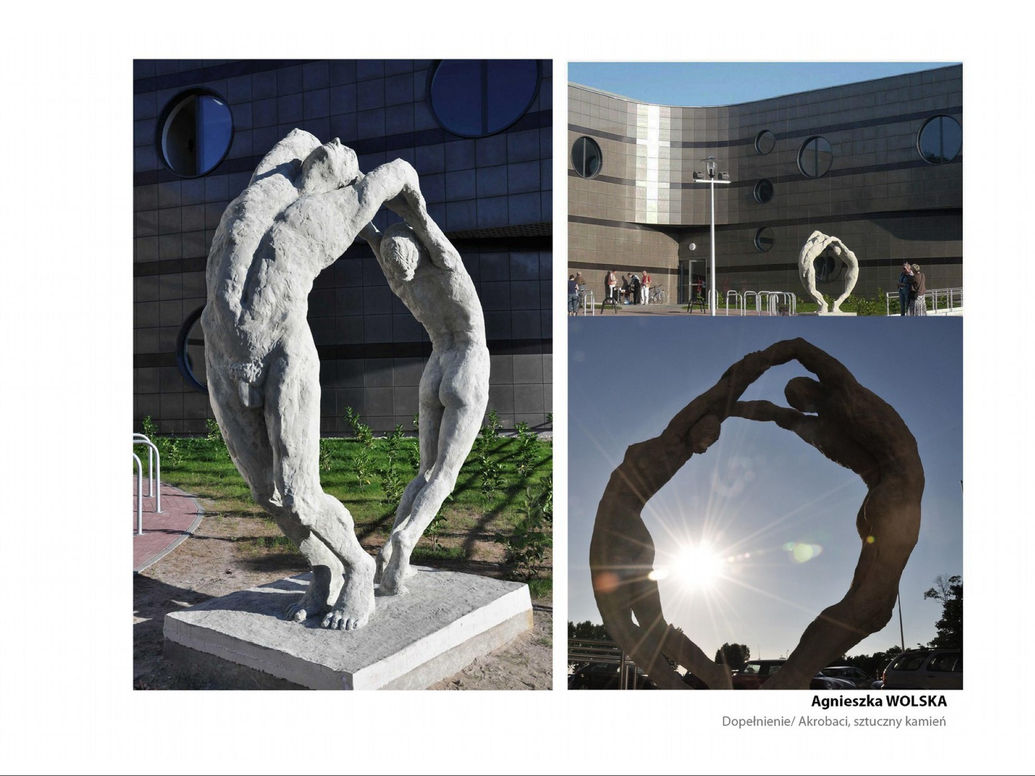 Kompozycja z dwóch rzeźb z jasnego kamienia, przedstawiających postacie w dynamicznej pozie, na tle nowoczesnego budynku z okrągłymi oknami i fragmentu parkingu w słoneczny dzień.