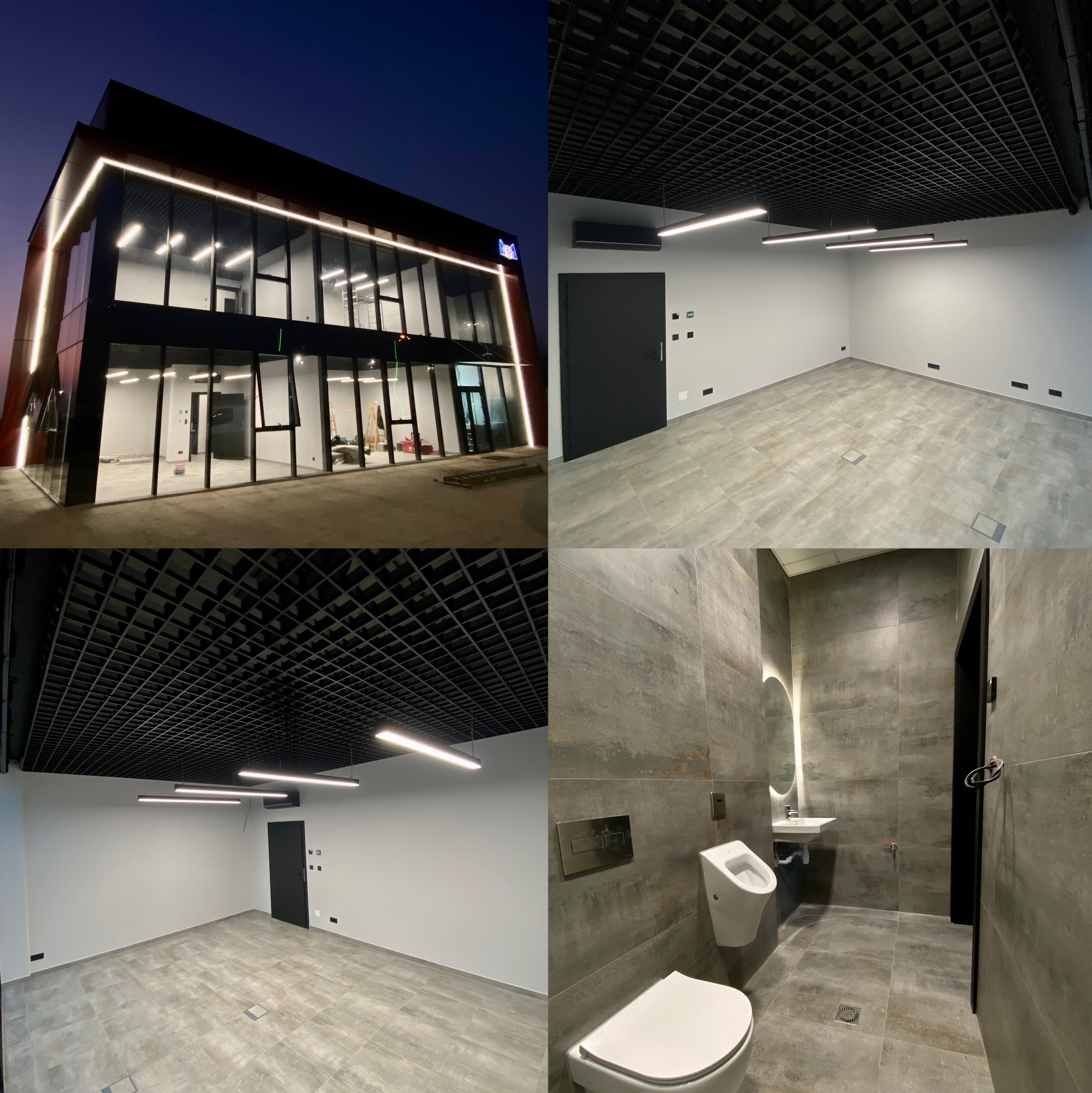 Nowoczesne wnętrze komercyjne: biuro z oknami, sufit rastrowy, minimalistyczna łazienka z szarymi płytkami i białym wyposażeniem. Widok z zewnątrz budynku.