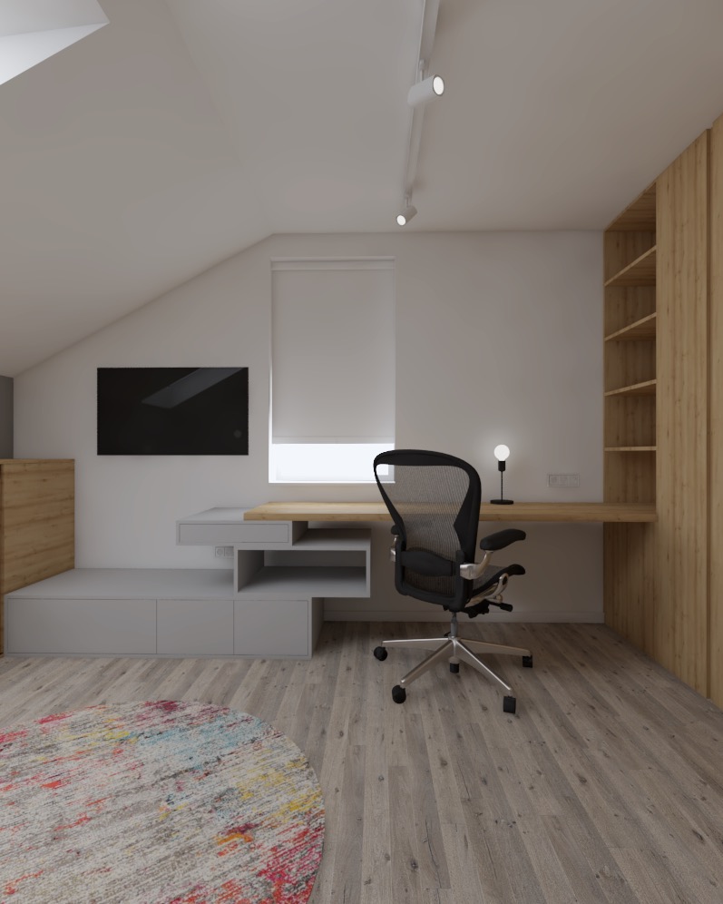 Aranżacja pokoju na poddaszu ze skośnym sufitem, biurko z szufladami, krzesło biurowe z siatkowym oparciem, okrągły dywan z kolorowymi akcentami i drewniana zabudowa regałowa.