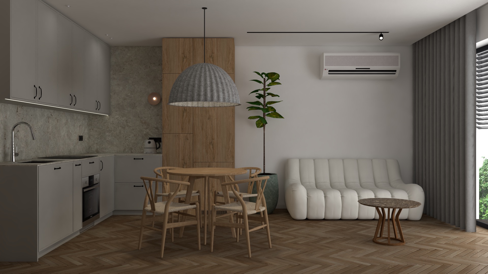 Nowoczesne wnętrze: jasna kuchnia z drewnianymi akcentami, okrągły stół z krzesłami, biała sofa i roślina doniczkowa, uzupełnione wiszącą lampą z szarego materiału.