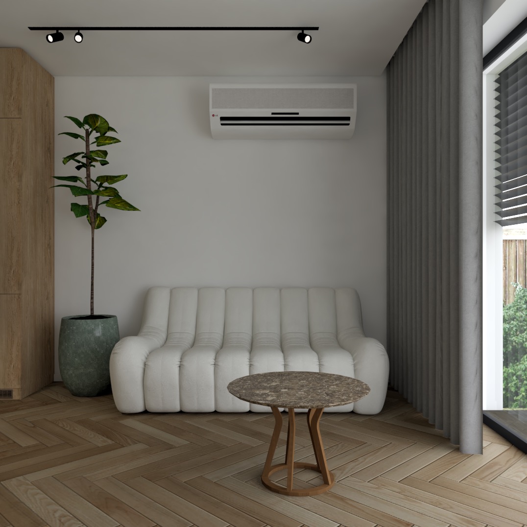 Wnętrze pokoju dziennego z białą sofą, okrągłym stolikiem z marmurowym blatem, dużą rośliną doniczkową, klimatyzatorem i parkietem ułożonym w jodełkę.