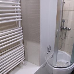 Jarosław Janik - Biały połysk szafa łazienkowa