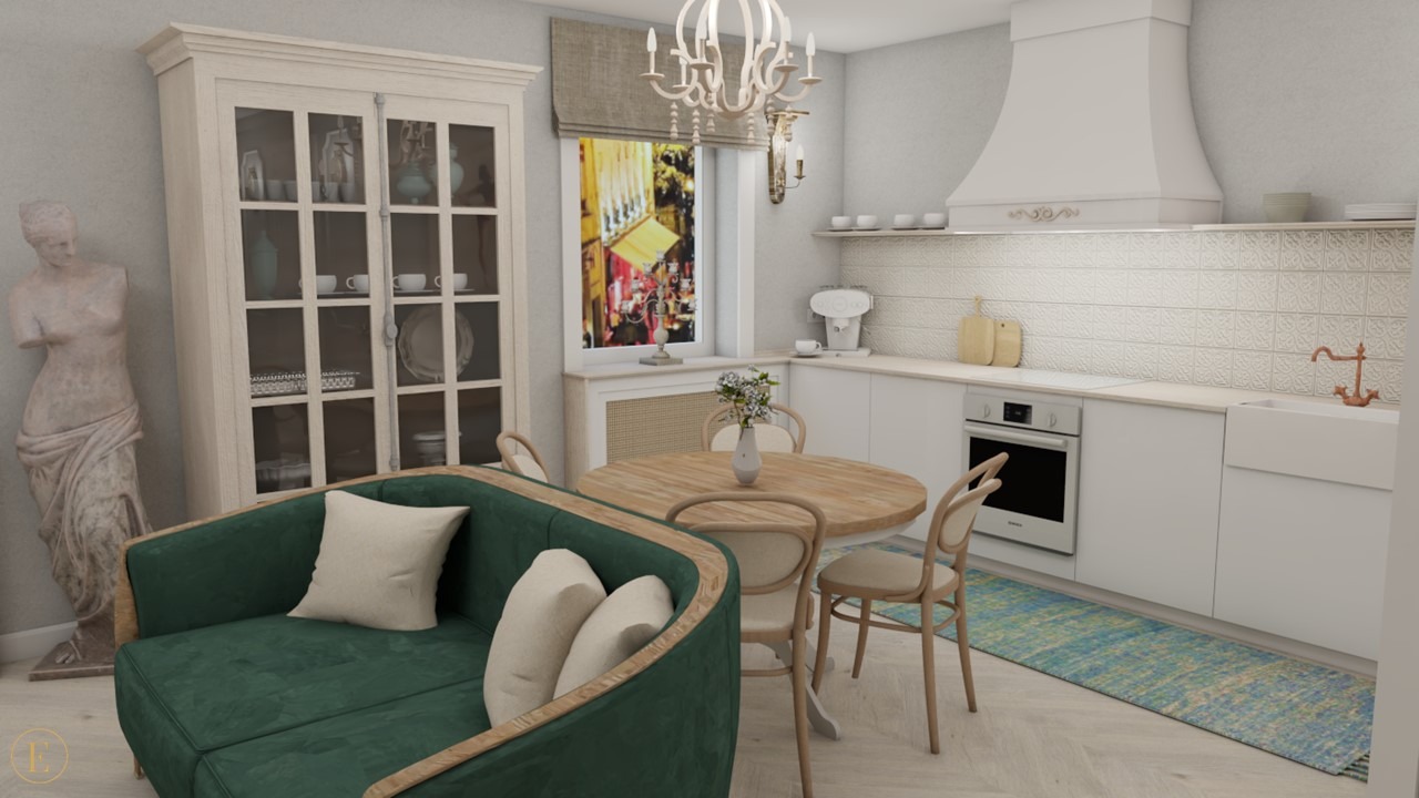Jasna kuchnia z okrągłym stołem i zieloną sofą. W tle witryna z dekoracjami i rzeźba. Nad stołem wisi ozdobny żyrandol. Całość w stylu klasycznym.
