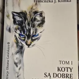 Okładka książki 'Najpiękniejsze wiersze o kotach Franciszka J. Klimka', tom I, z ilustracją kota w stylu szkicu ołówkiem i niebieskimi oczami.