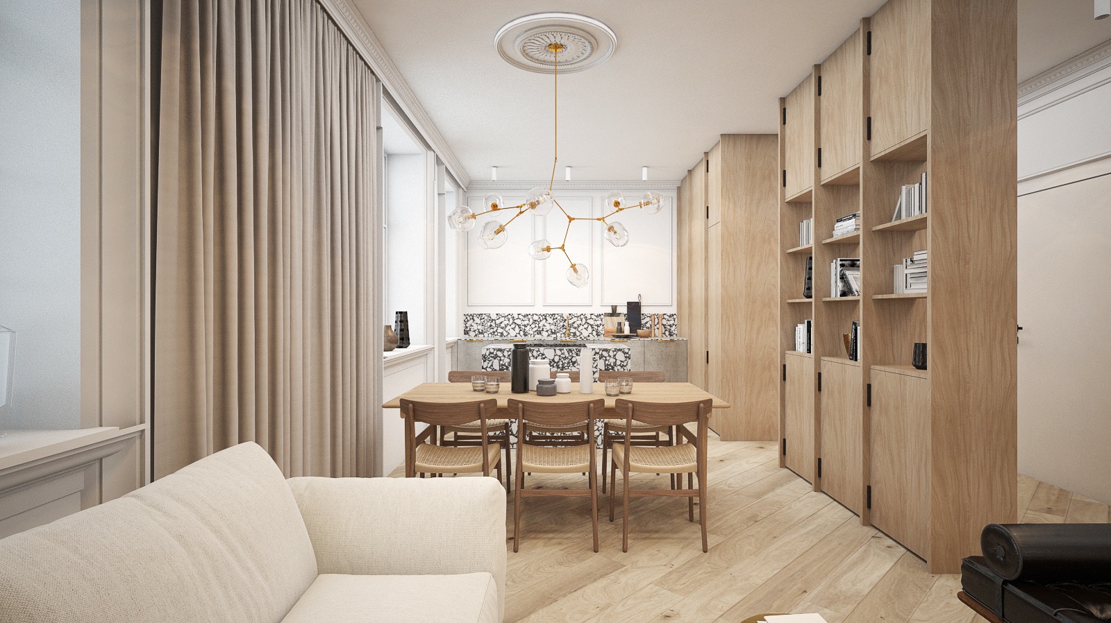 Jasne wnętrze z drewnianą podłogą, stołem jadalnym z krzesłami, regałem na książki i sofą, oświetlone nowoczesną lampą wiszącą z przezroczystymi kloszami.