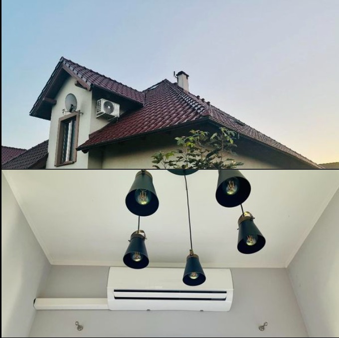 Zewnętrzny klimatyzator na elewacji domu z czerwoną dachówką i wewnętrzny klimatyzator split pod nowoczesną lampą sufitową z pięcioma czarnymi kloszami