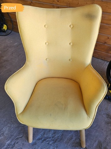 Żółty fotel uszak z tapicerką przed czyszczeniem, widoczne plamy i zabrudzenia, ujęcie z góry, napis 'Przed' w lewym górnym rogu.