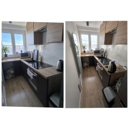 Kryształowa Strefa Klaudia Żmija - Dwa ujęcia tej samej, nowocześnie urządzonej kuchni z drewnianymi blatami i ciemnymi frontami, z rośliną na parapecie, czajnikiem elektrycznym i koszem na śmieci pod blatem.