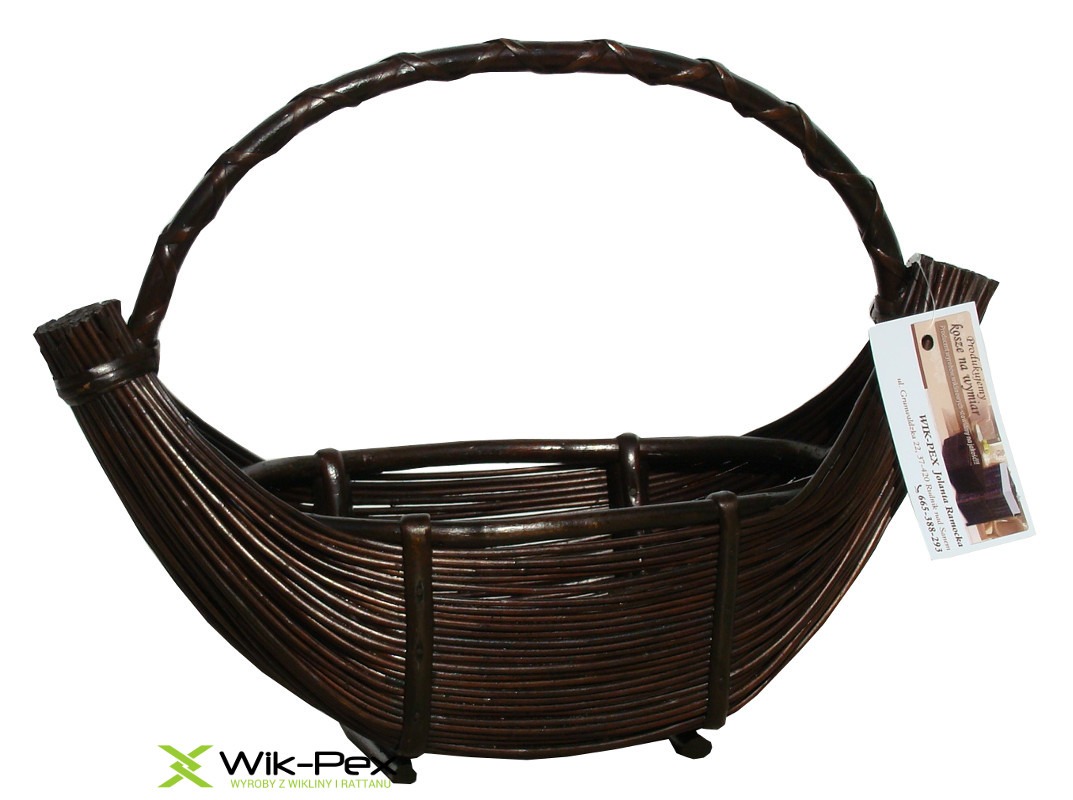 Brązowy, pleciony kosz z wikliny z uchwytem, widoczna etykieta producenta Wik-Pex i logo firmy w lewym dolnym rogu.