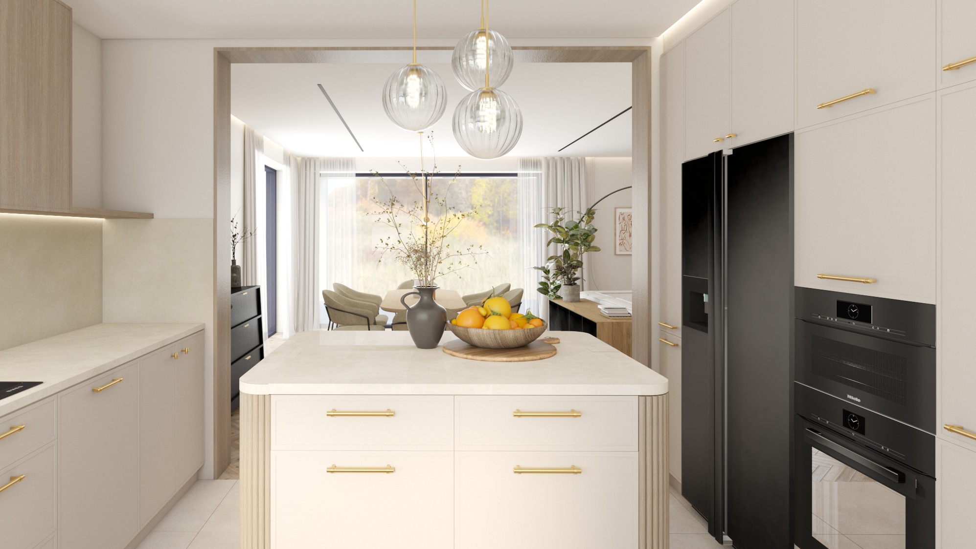 Jasna kuchnia z wyspą, złotymi uchwytami i czarnym sprzętem AGD Miele, widok na jadalnię z oknem na ogród.