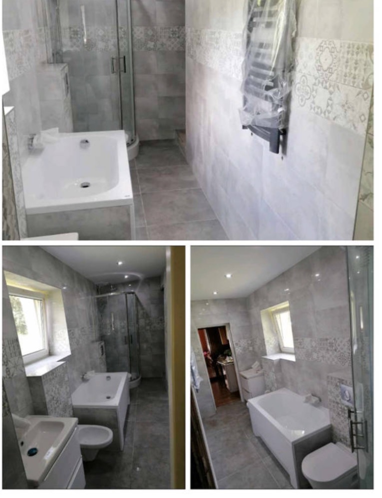 Wykończona łazienka z szarymi płytkami, białą wanną, kabiną prysznicową i grzejnikiem drabinkowym w folii ochronnej.