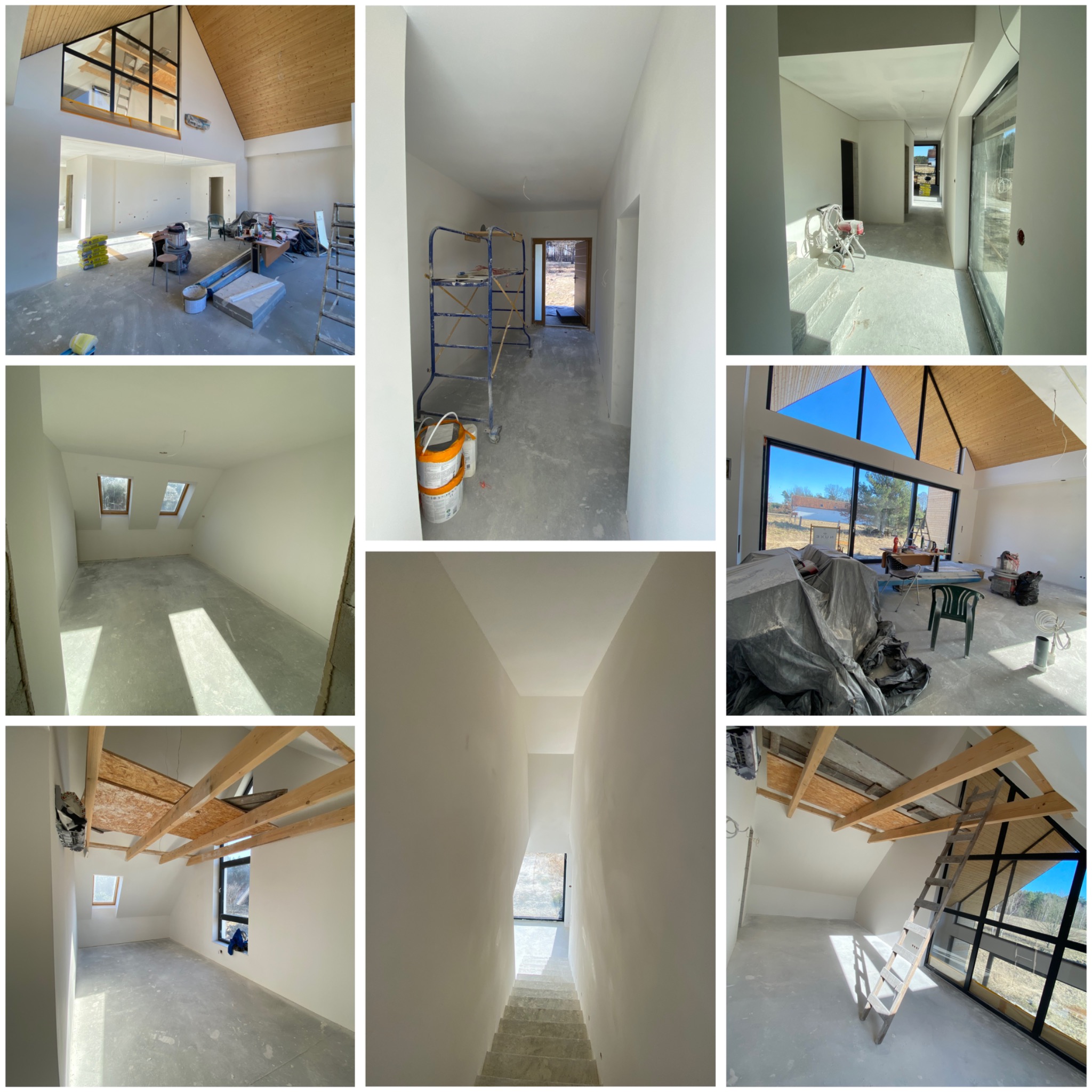 Wnętrza domu po szpachlowaniu i malowaniu na biało. Widoczne pomieszczenia z oknami, schody, rusztowania malarskie i worki z materiałami budowlanymi.