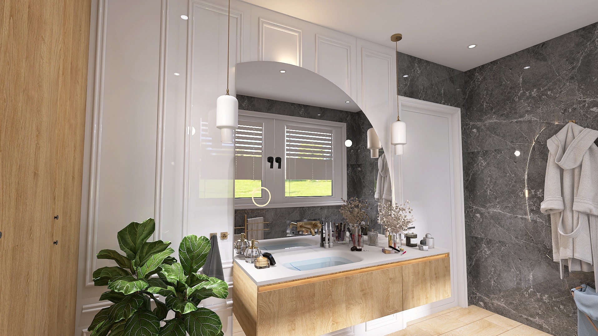 Elegancka łazienka z drewnianą szafką pod umywalką, marmurową ścianą i dużym lustrem o nietypowym kształcie. Roślina w doniczce dodaje świeżości wnętrzu.