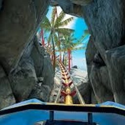 Łukasz Prusiński Centrum VR - Symulacja przejazdu rollercoasterem z widokiem na tropikalną plażę przez skalny tunel, perspektywa z pierwszego wagonu.