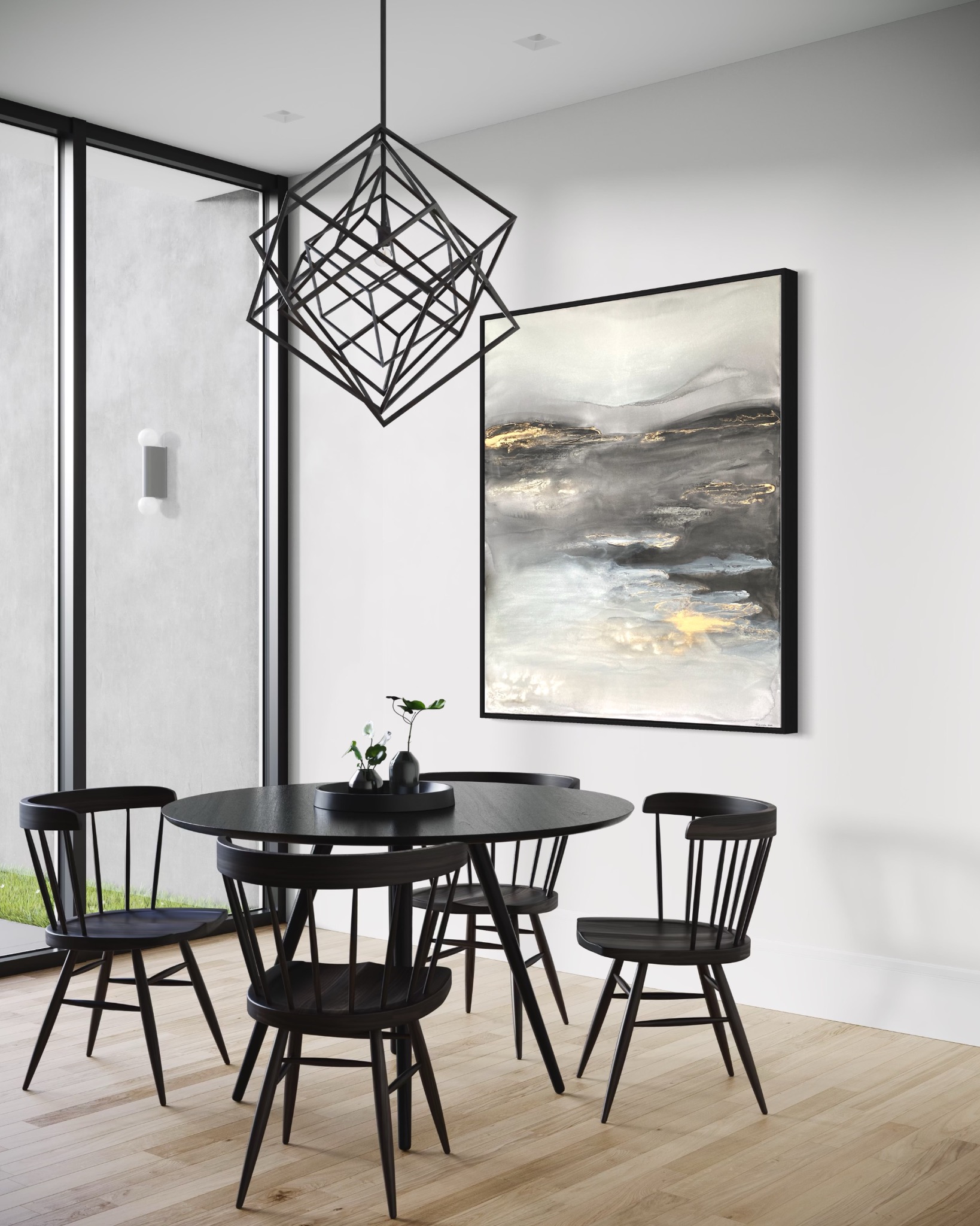 Abstrakcyjny obraz w czarnej ramie nad czarnym, okrągłym stołem z czterema krzesłami w nowoczesnym wnętrzu z dużym oknem i geometryczną lampą wiszącą.