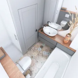 Wnętrze łazienki z mozaikową podłogą, dwiema owalnymi umywalkami na drewnianym blacie z szarą szafką, białą wanną i toaletą, oraz suszonymi trawami w ceramicznym wazonie.