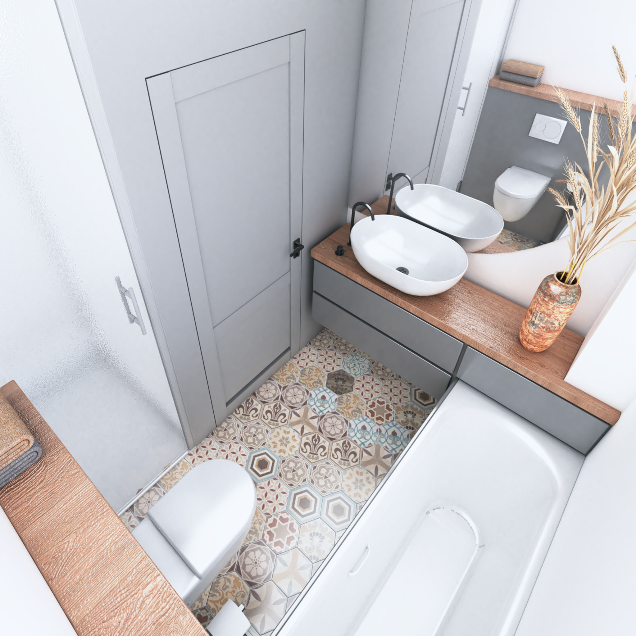 Wnętrze łazienki z mozaikową podłogą, dwiema owalnymi umywalkami na drewnianym blacie z szarą szafką, białą wanną i toaletą, oraz suszonymi trawami w ceramicznym wazonie.