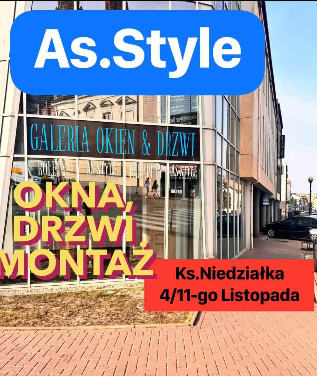 Fasada budynku z napisem 'Galeria Okien & Drzwi', oferującego okna, drzwi i montaż. Reklama firmy As.Style z adresem Ks.Niedziałka 4/11 Listopada.
