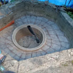 Renowacja oczka wodnego,usuniecie starego dna,za zbrojenie i ponowne zalanie