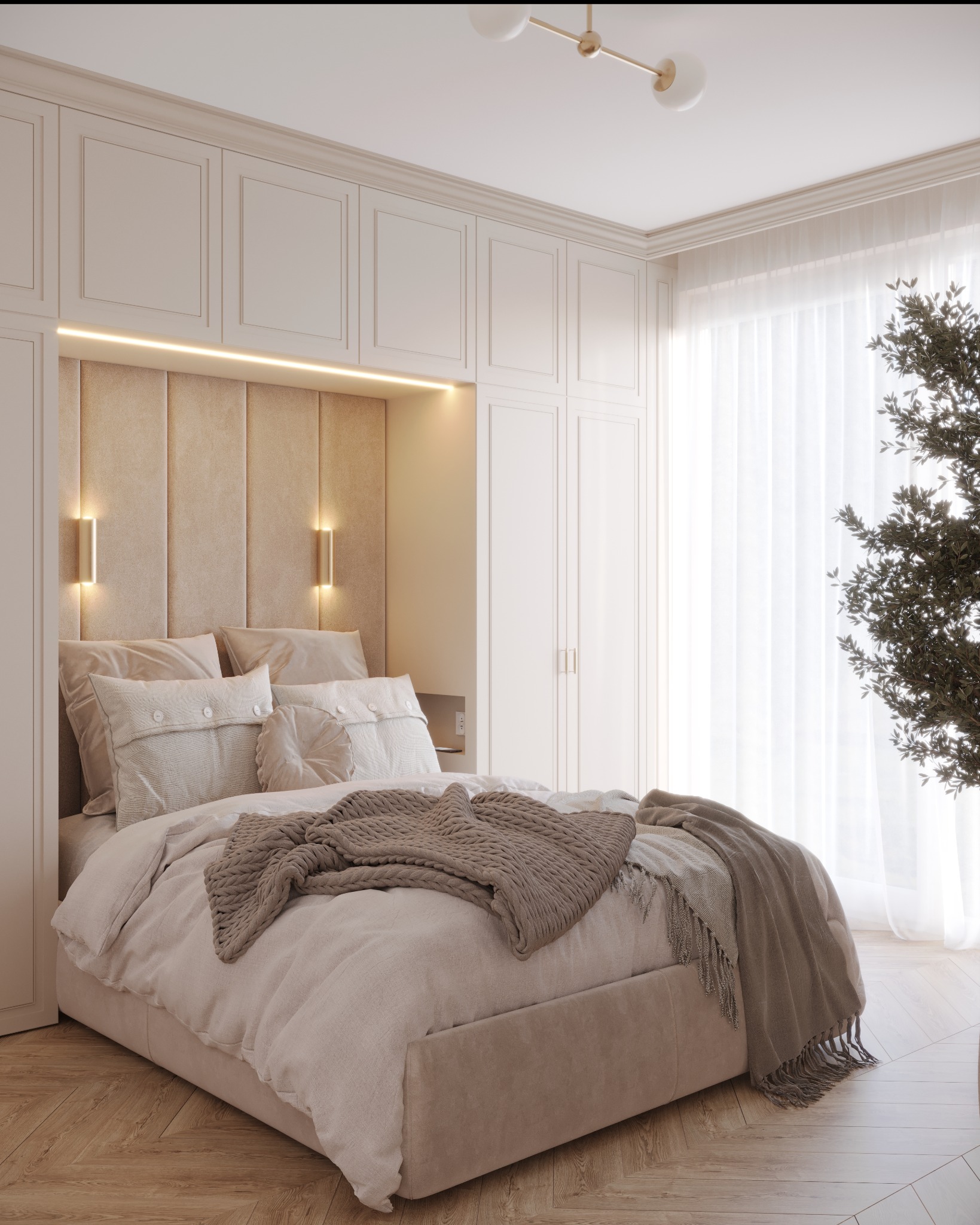 Jasna sypialnia z łóżkiem typu king-size, tapicerowanym wezgłowiem i wbudowanymi szafami z oświetleniem LED, parkiet w jodełkę i dekoracyjna roślina przy oknie.