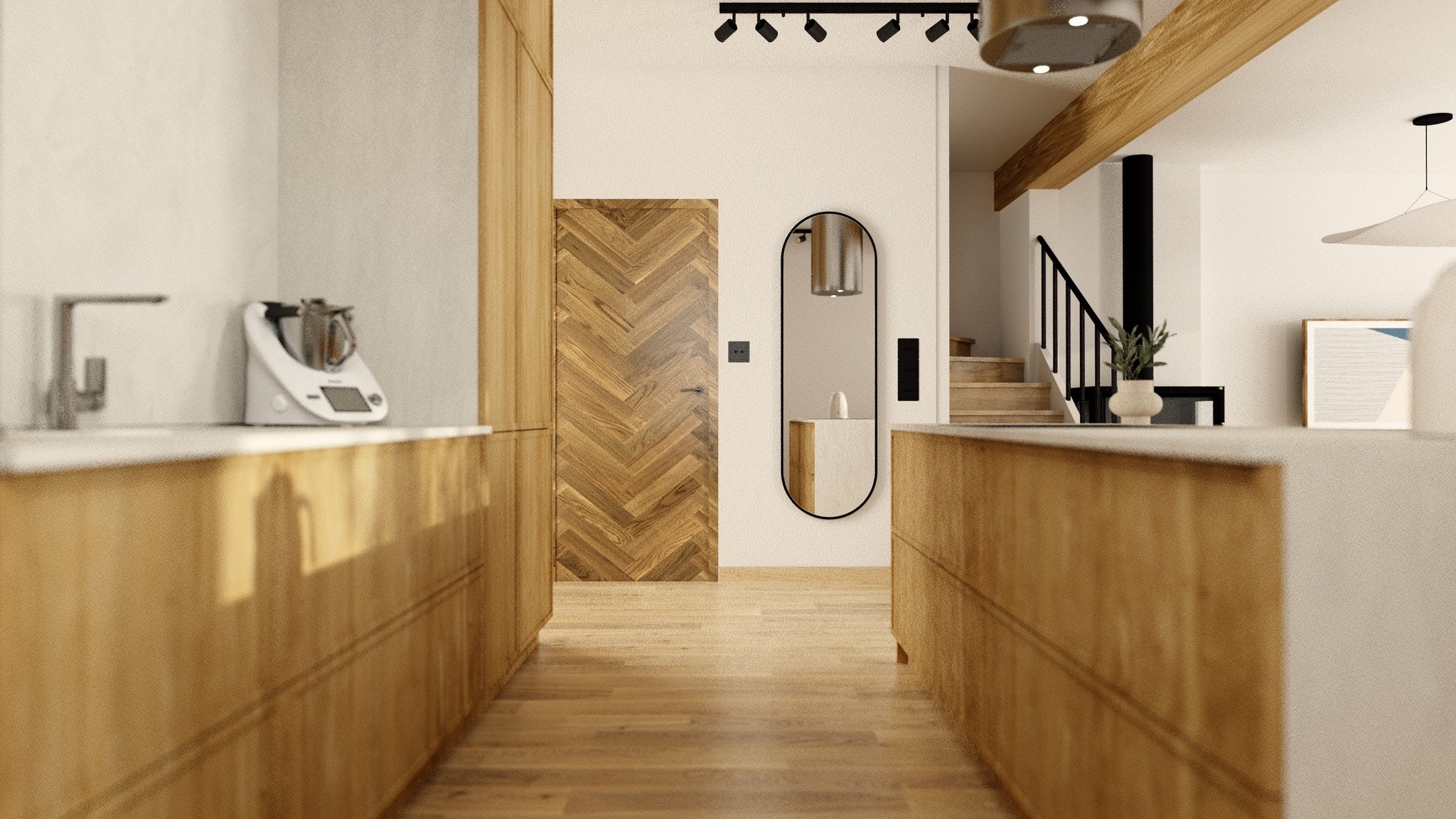 Nowoczesna kuchnia z drewnianymi szafkami, parkietem w jodełkę na drzwiach i podłodze, minimalistycznym lustrem oraz schodami w tle.