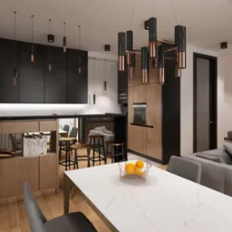Nowoczesna aranżacja wnętrza: otwarta kuchnia z wyspą i jadalnią, czarne szafki, drewniane akcenty, marmurowy stół z owocami, designerska lampa wisząca.