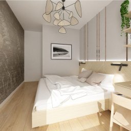 OSA HOME CONCEPT - Nowoczesna sypialnia z łóżkiem, biurkiem i półkami na książki, oświetlona lampą wiszącą z rattanowymi elementami, z tapetą z motywem roślinnym i czarno-białym obrazem na ścianie.