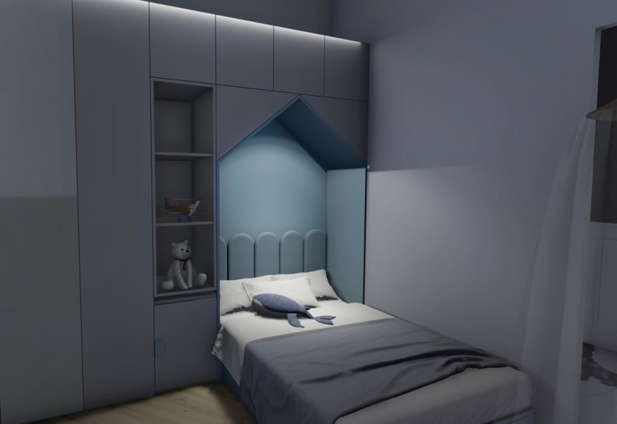 Pokój dziecięcy z zabudową meblową w odcieniach szarości i błękitu, łóżko z zagłówkiem w kształcie zaokrąglonych paneli, półka z zabawkami: pluszowy miś i model samolotu.
