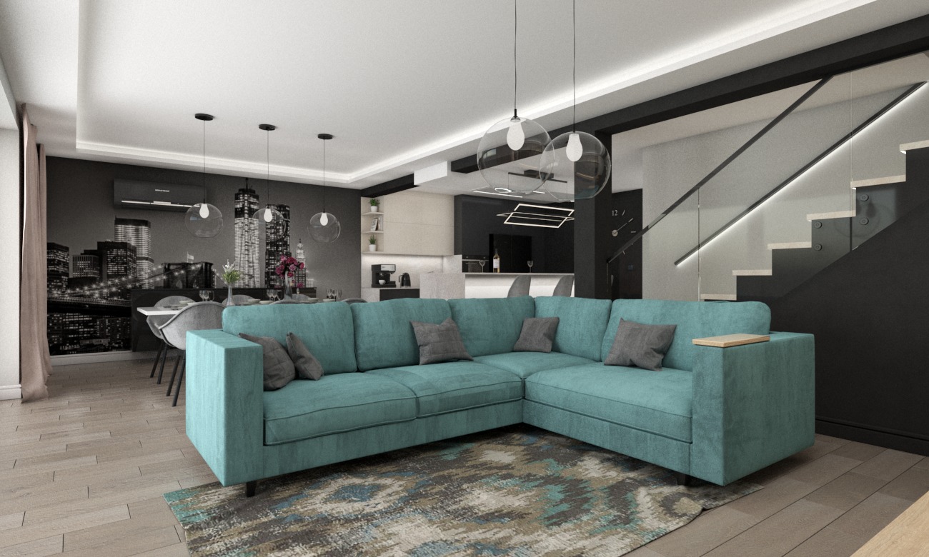 Turkusowy narożnik z szarymi poduszkami na wzorzystym dywanie w nowoczesnym salonie z widokiem na kuchnię i schody; na ścianie fototapeta z panoramą miasta.