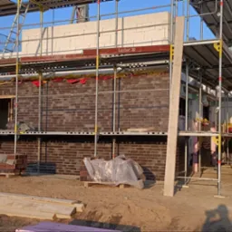 Budowa budynku wielorodzinnego+elewacja cegła klinkier