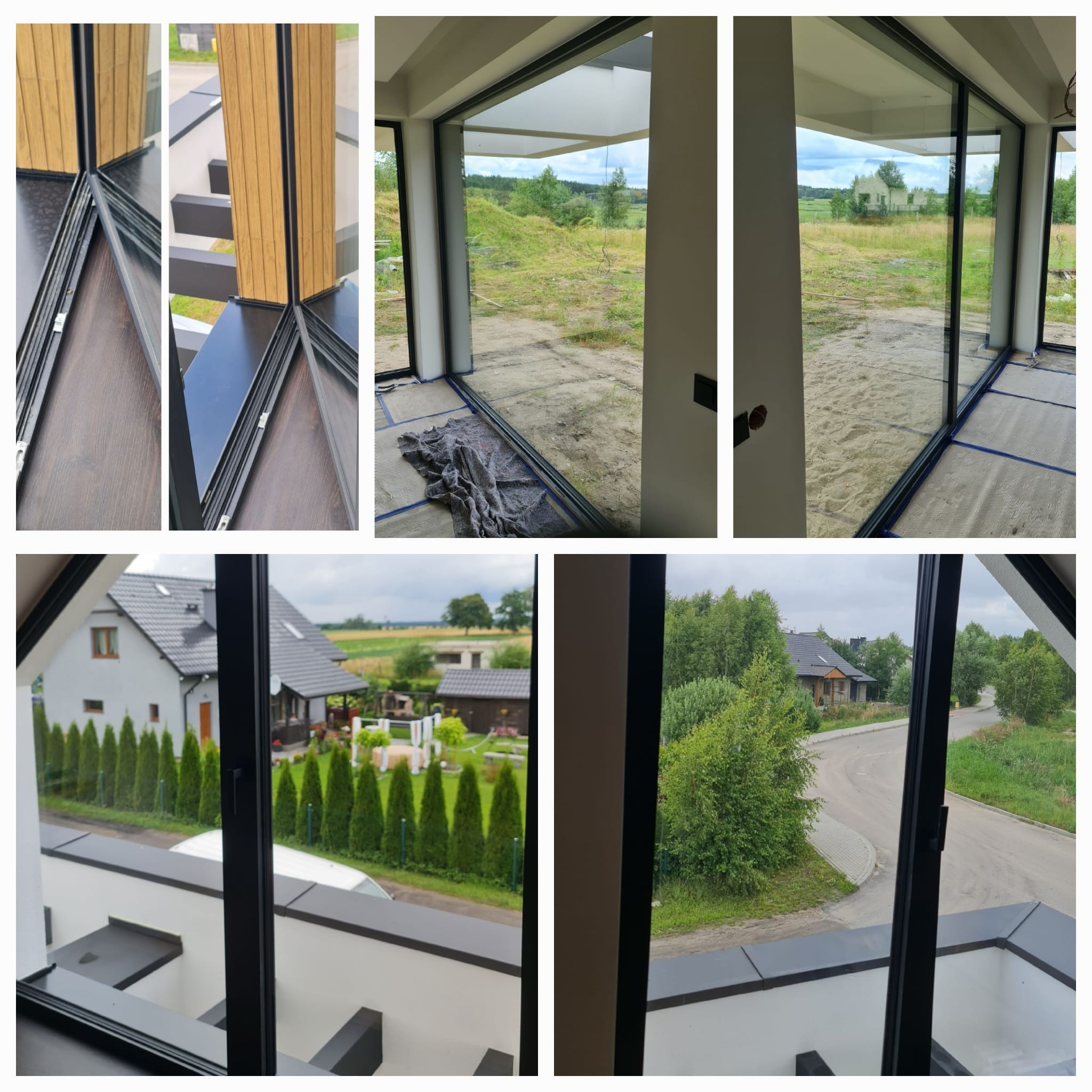 Nowoczesne, panoramiczne okna z czarnymi ramami, widok na zewnątrz. Detal wykończenia okien z drewnianym akcentem. Wnętrze w trakcie wykańczania, widoczne zabezpieczenia podłogi.