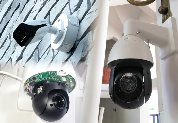 Kompozycja trzech kamer przemysłowych: kamera tubowa Dahua na tle ściany z imitacji kamienia, kamera obrotowa PTZ z widoczną elektroniką oraz kamera PTZ zamontowana na słupie.