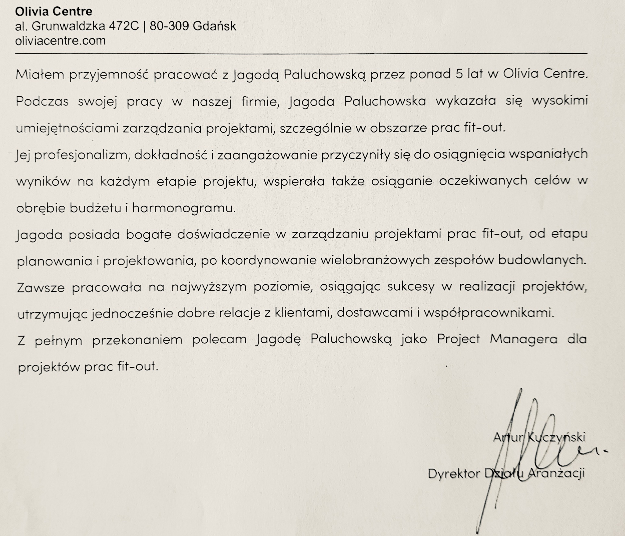 Skan referencji dla Jagody Paluchowskiej, Project Managera projektów fit-out, podpisany przez Artura Kuczyńskiego, Dyrektora Działu Aranżacji, Olivia Centre.